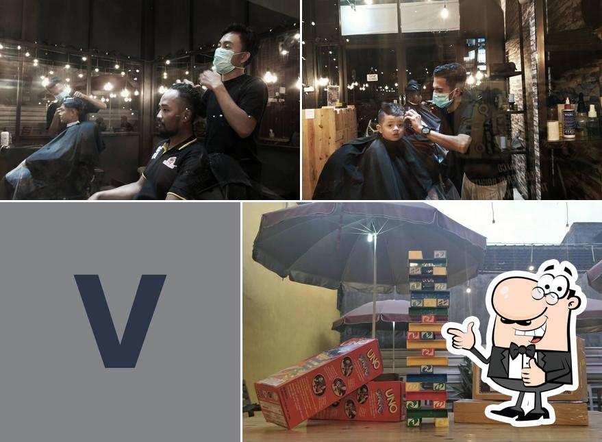 VILLAGE BARBER & CAVE