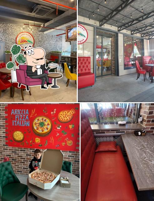 Посмотрите на внутренний интерьер "Ариция Пицца"