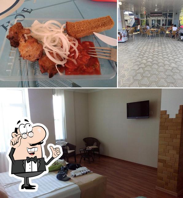 Изображение, на котором видны внутреннее оформление и еда в Катамаран