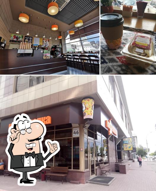 Это снимок, где изображены внутреннее оформление и напитки в Кофемолка